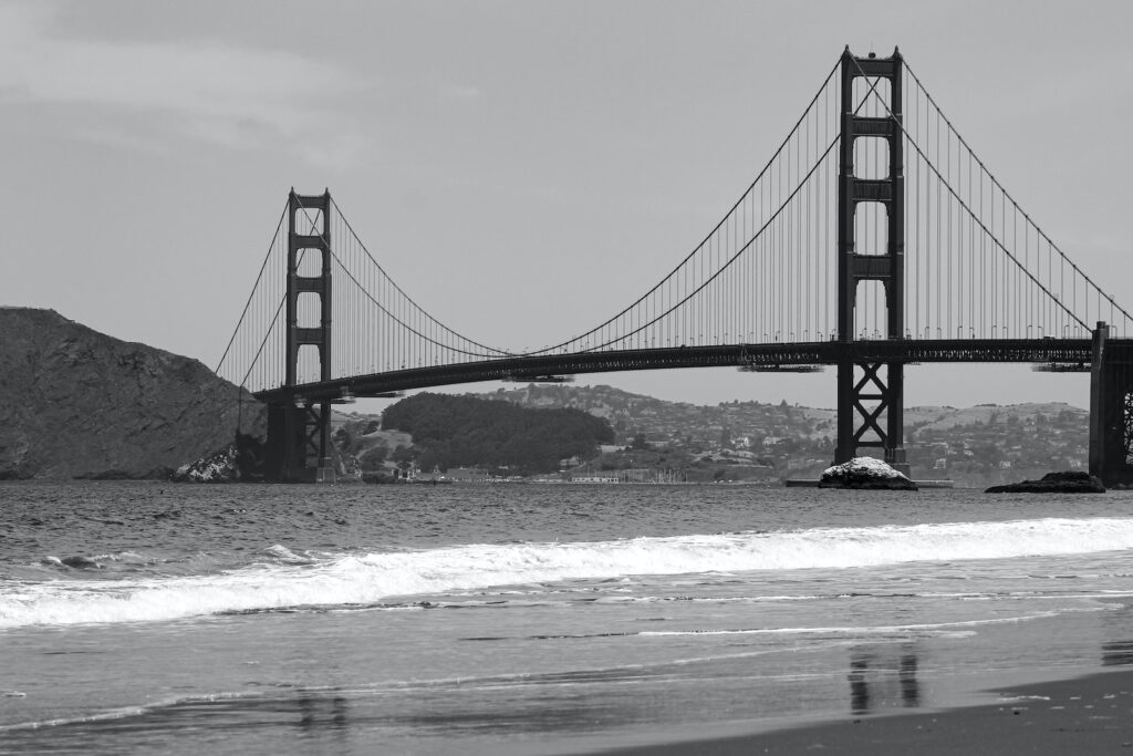 BART Real-Time 
 | Grayscale photo of a Bridge